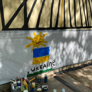 Логотип телеграм спільноти - RAZOM im KREATIVHAUS 💙💛